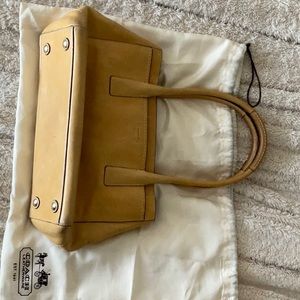 Coach bag with dust bag.